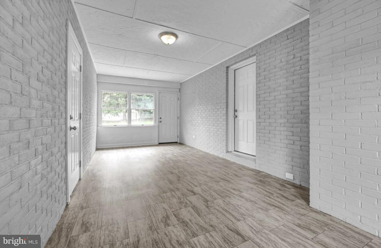 525 Mountain Road Dillsburg, PA 17019 - Photo 49 of 53 a view of empty room with wooden floor and fan
