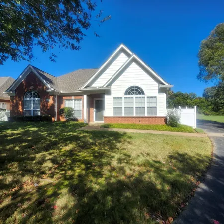 a view of a house with a big yard