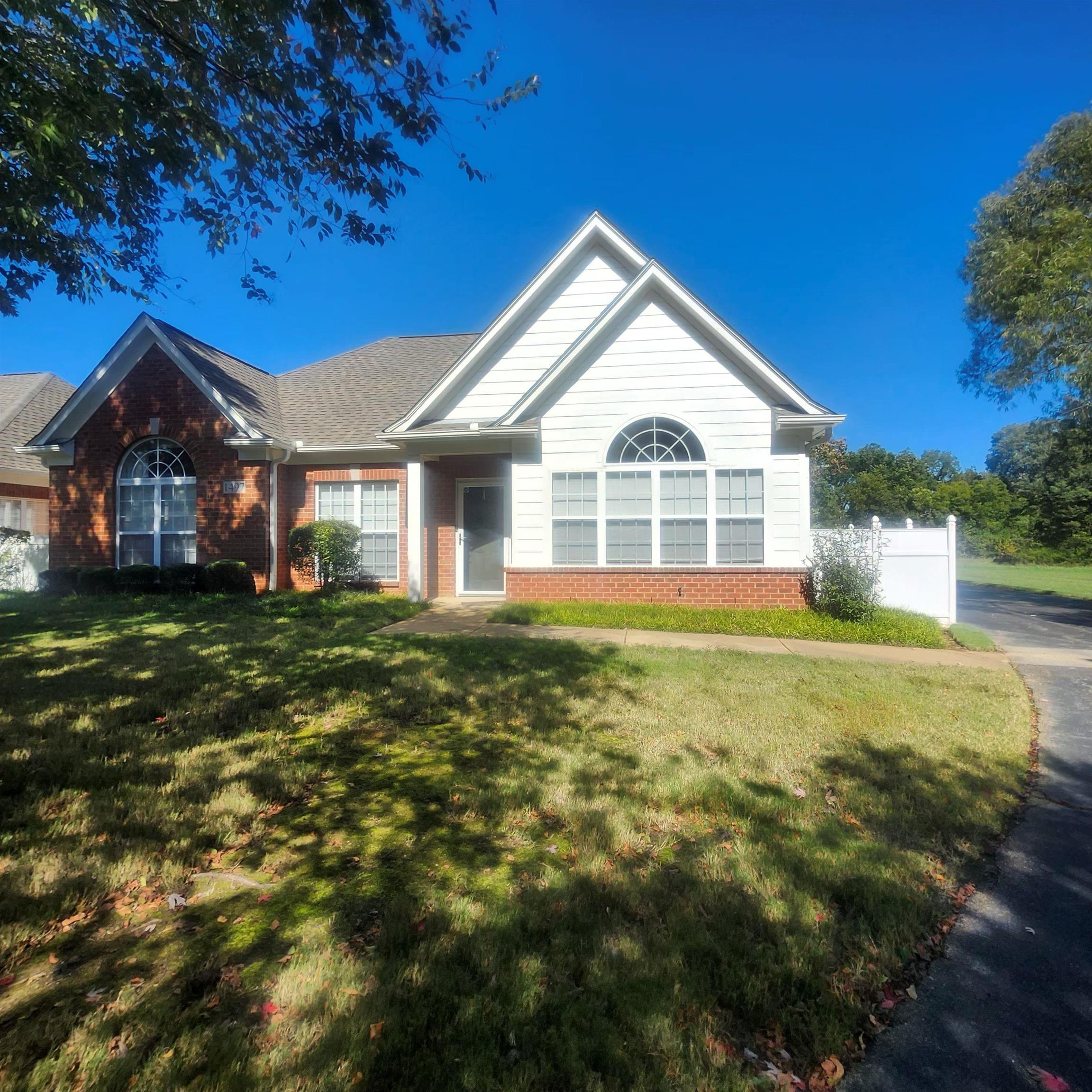 1497 Castle Pines Circle, Unit 18 Collierville, TN 38017 - Photo 2 of 23 Single story home featuring brick siding