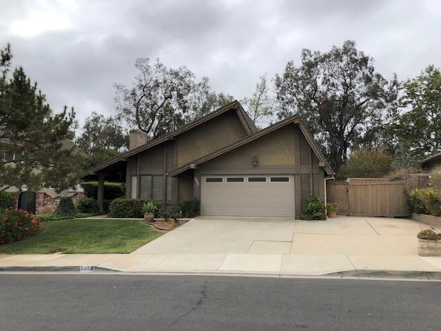 1095 Old Ranch Road Camarillo, CA 93012 - Photo 1 of 12 a house that has a tree in front of it