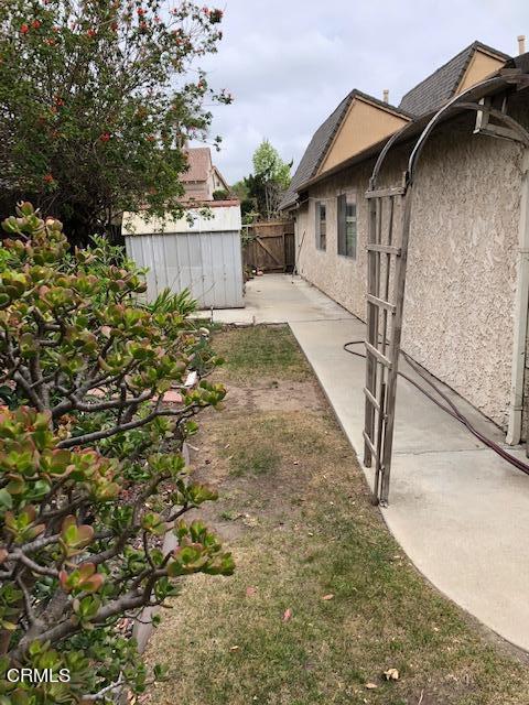 1095 Old Ranch Road Camarillo, CA 93012 - Photo 11 of 12 a view of a house with a yard