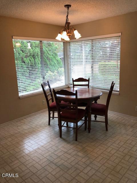 1095 Old Ranch Road Camarillo, CA 93012 - Photo 7 of 12 a view of a dining room with furniture window and outside view