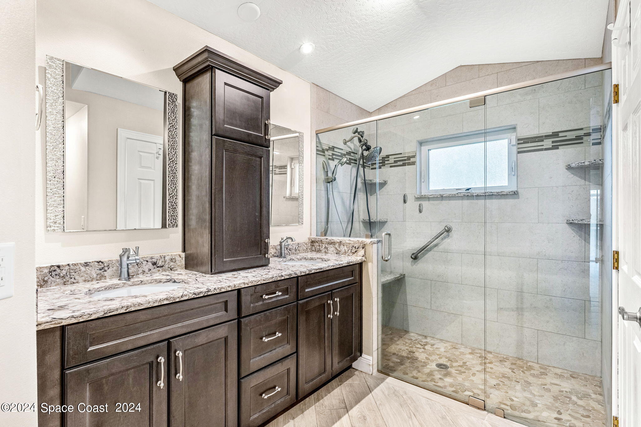 431 Nina Road Northeast Palm Bay, FL 32907 - Photo 17 of 41 a bathroom with a granite countertop sink mirror and double