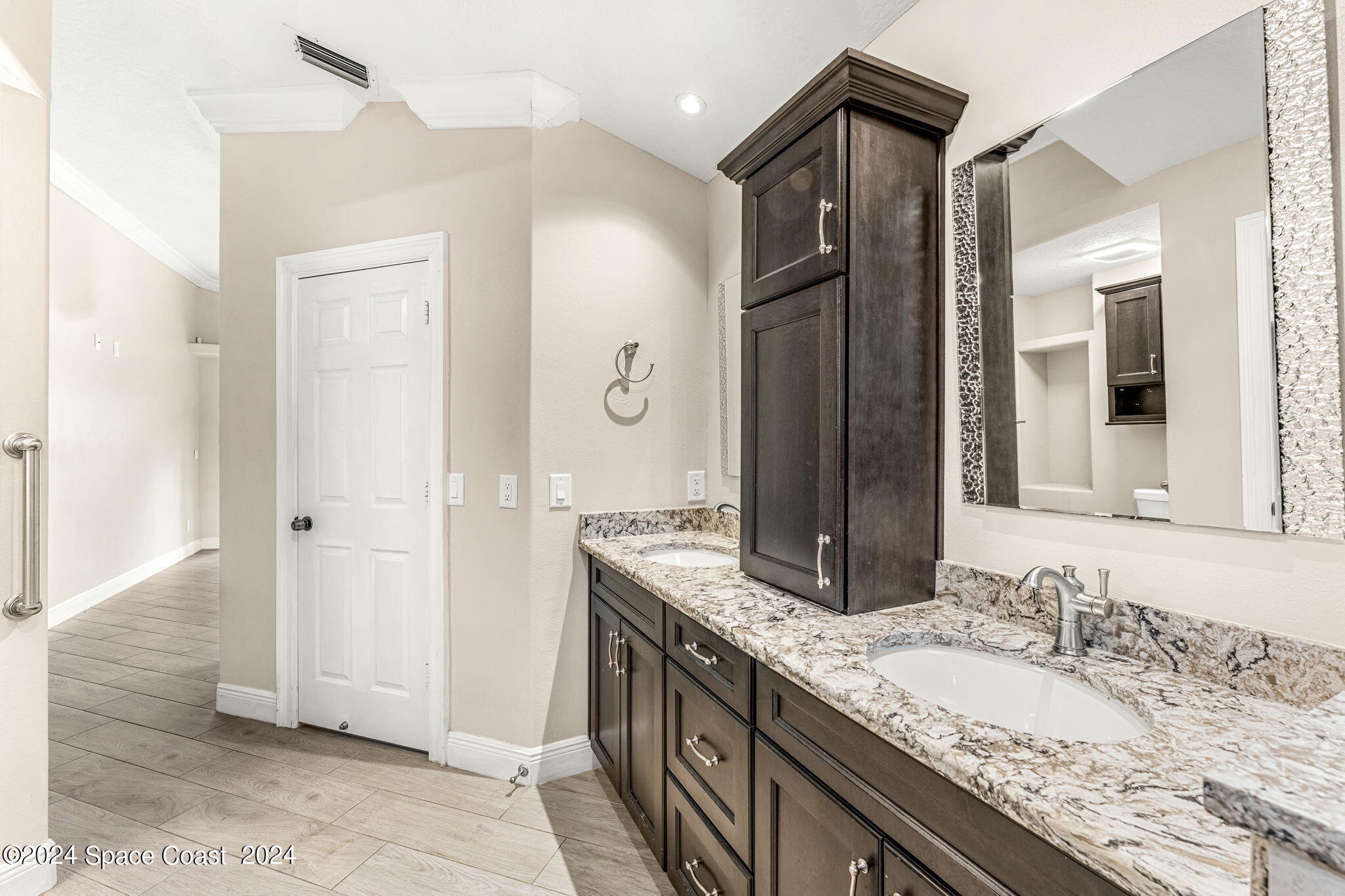 431 Nina Road Northeast Palm Bay, FL 32907 - Photo 18 of 41 a bathroom with a granite countertop double vanity sink and a mirror