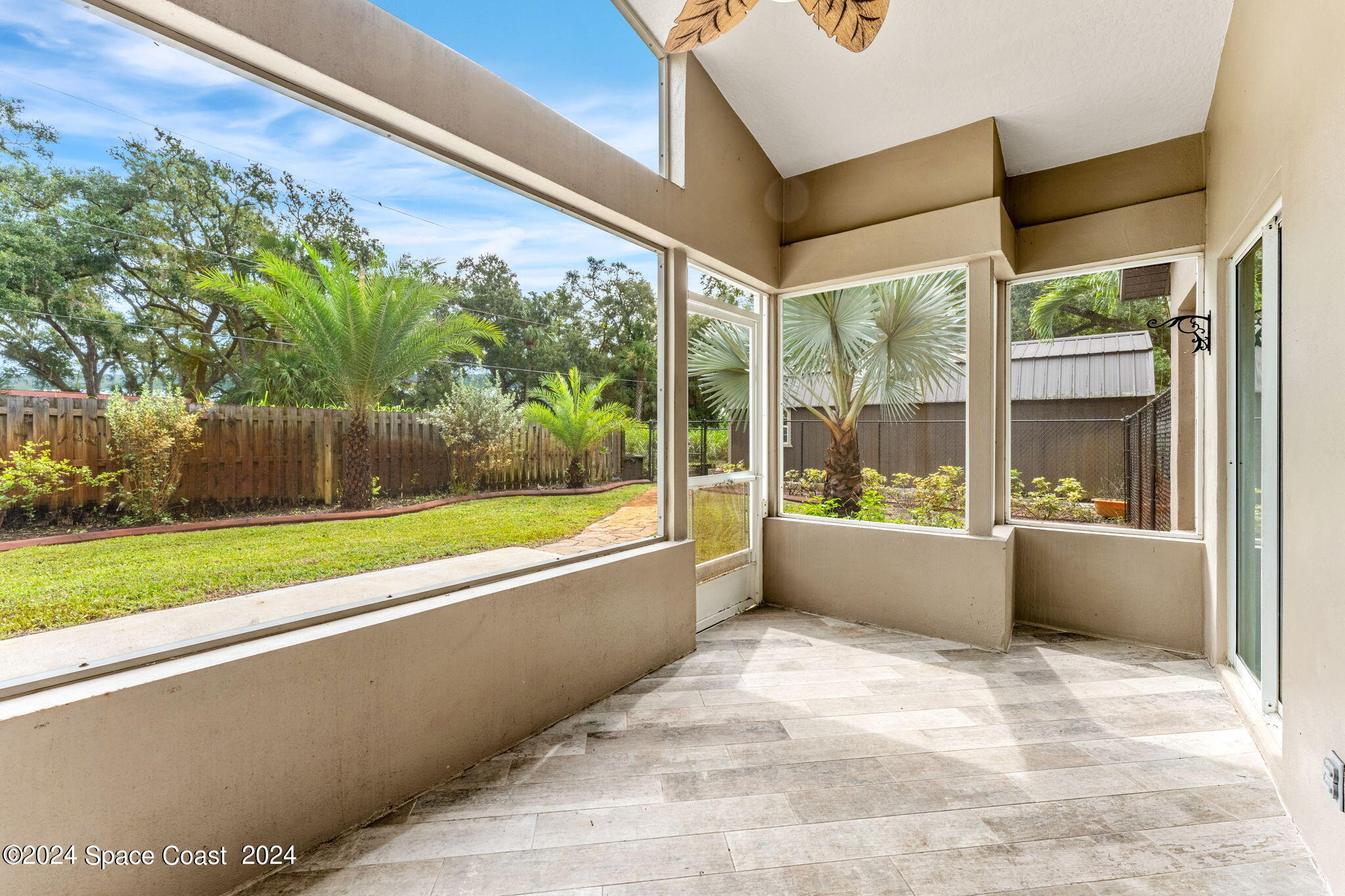 431 Nina Road Northeast Palm Bay, FL 32907 - Photo 23 of 41 a view of an outdoor space with a swimming pool