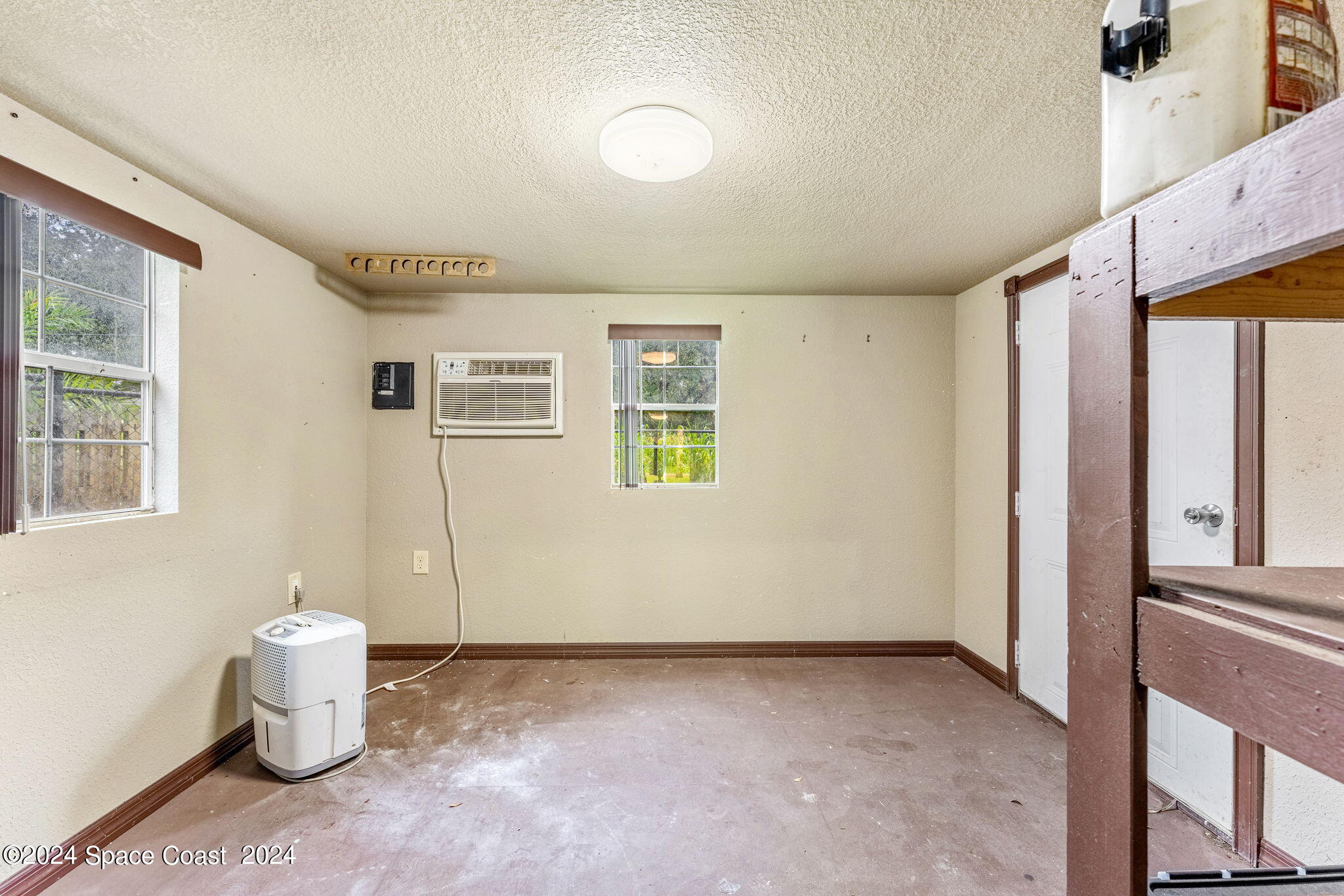 431 Nina Road Northeast Palm Bay, FL 32907 - Photo 29 of 41 a view of a storage & utility room