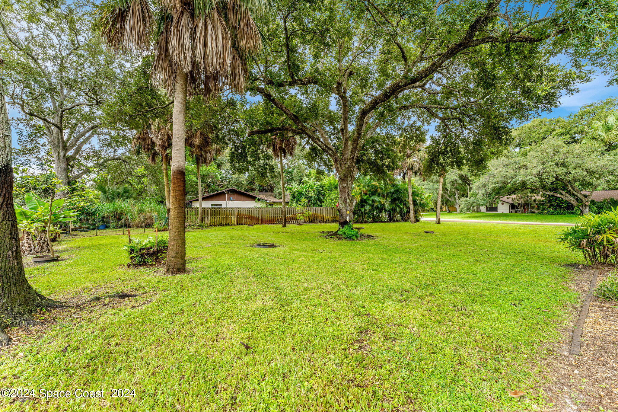 431 Nina Road Northeast Palm Bay, FL 32907 - Photo 31 of 41 a view of a park with a tree