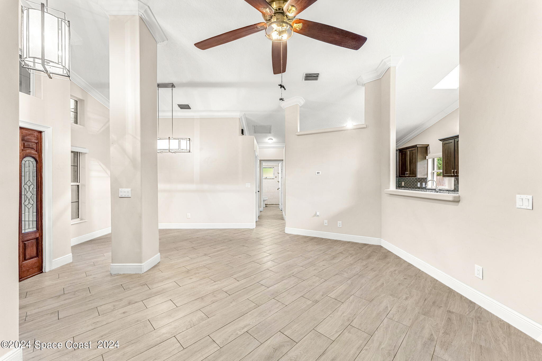 431 Nina Road Northeast Palm Bay, FL 32907 - Photo 8 of 41 a view of a hallway with a white walls