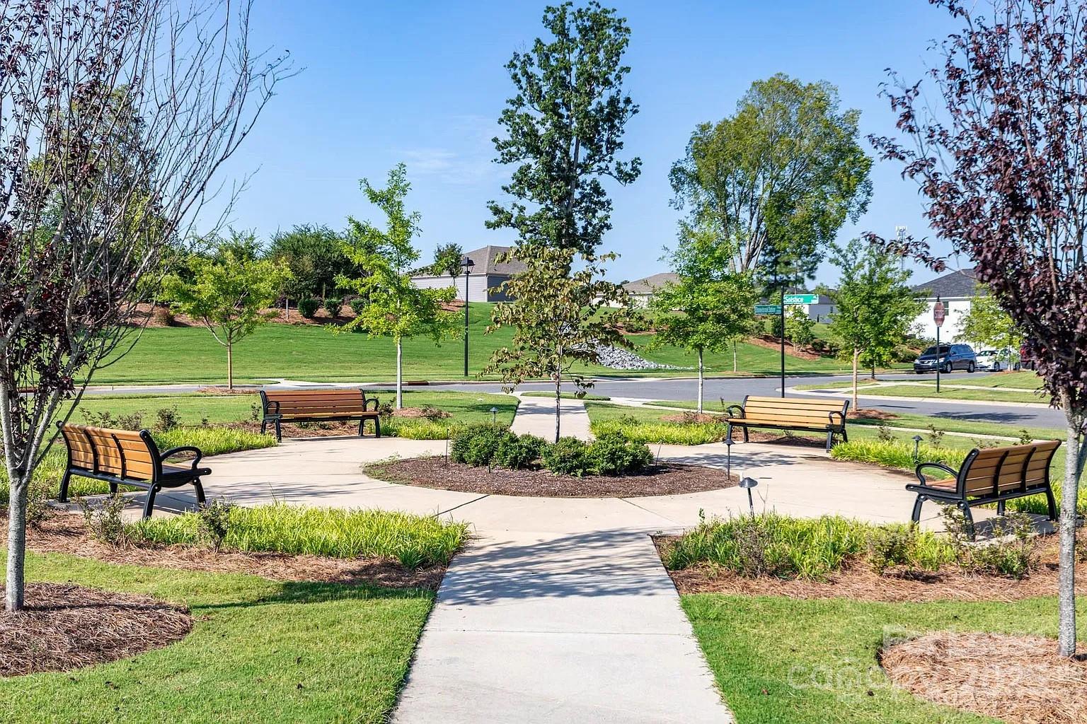 11509 Corleone Street Huntersville, NC 28078 - Photo 19 of 21 a view of a park with plants and trees