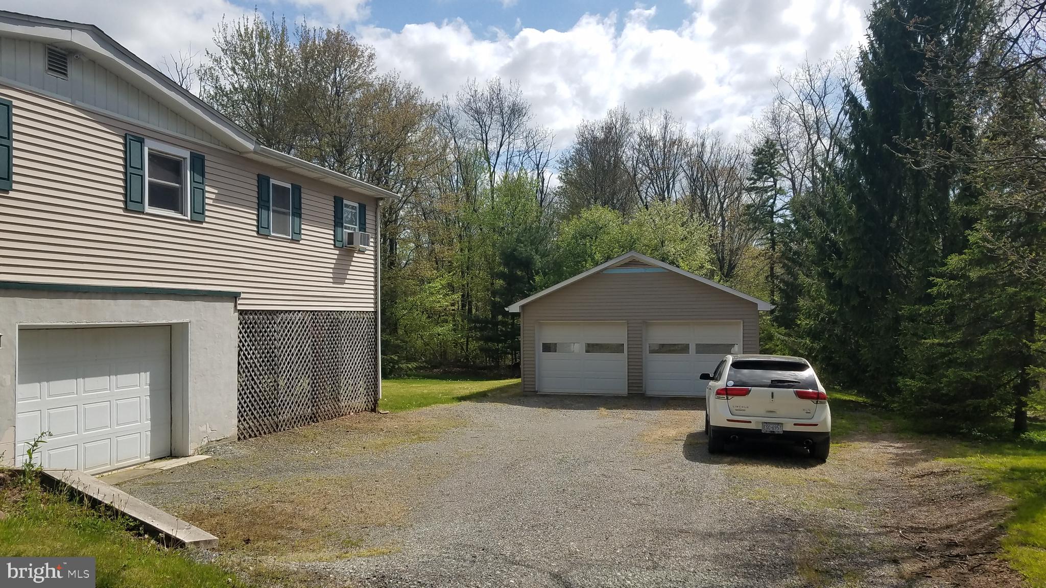 243 Whitetail Crossing Road Tamaqua, PA 18252 - Photo 28 of 30 Side view and 22 x 40 Over Sized Garage