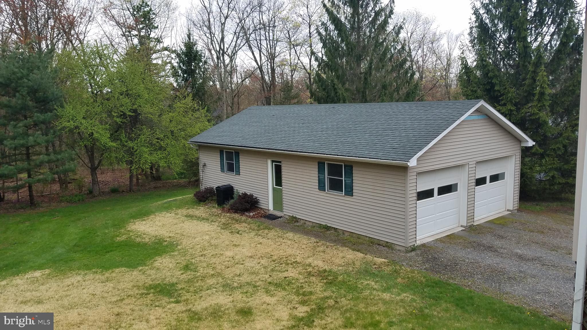 243 Whitetail Crossing Road Tamaqua, PA 18252 - Photo 30 of 30 Garage with storage above ceiling