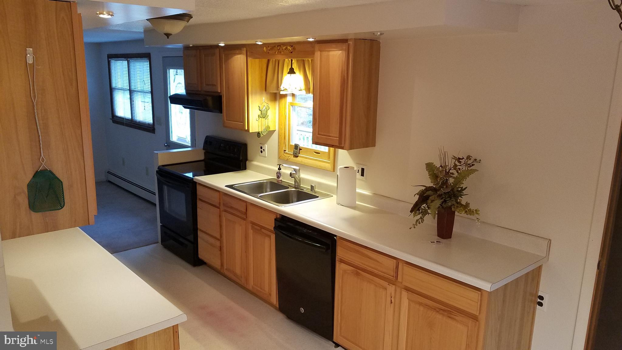 Kitchen area with all appliances