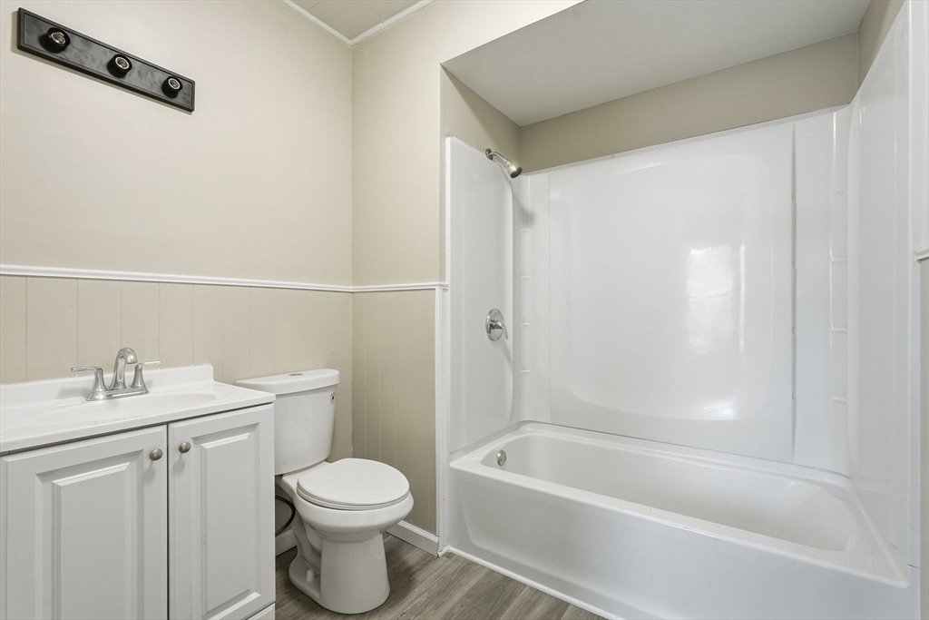 62 East Main Street Erving, MA 01344 - Photo 12 of 23 a bathroom with a sink a toilet and shower