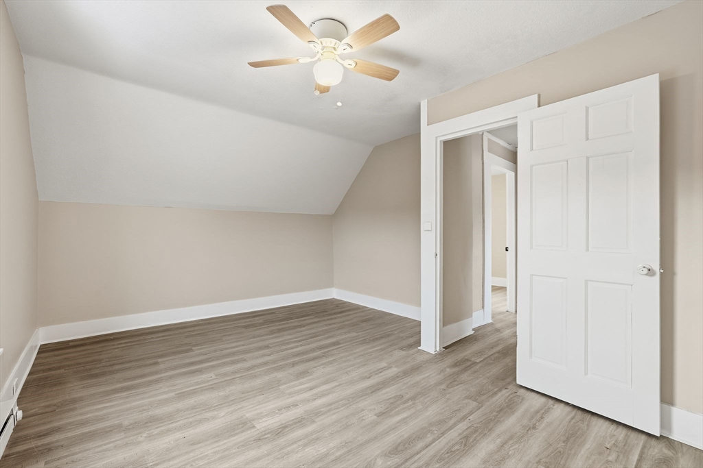62 East Main Street Erving, MA 01344 - Photo 14 of 23 a view of an empty room with wooden floor