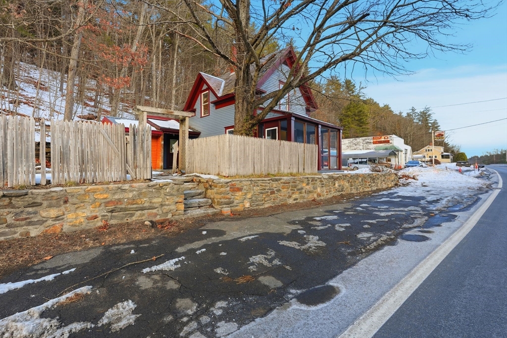62 East Main Street Erving, MA 01344 - Photo 21 of 23 a view of a house with snow on the road