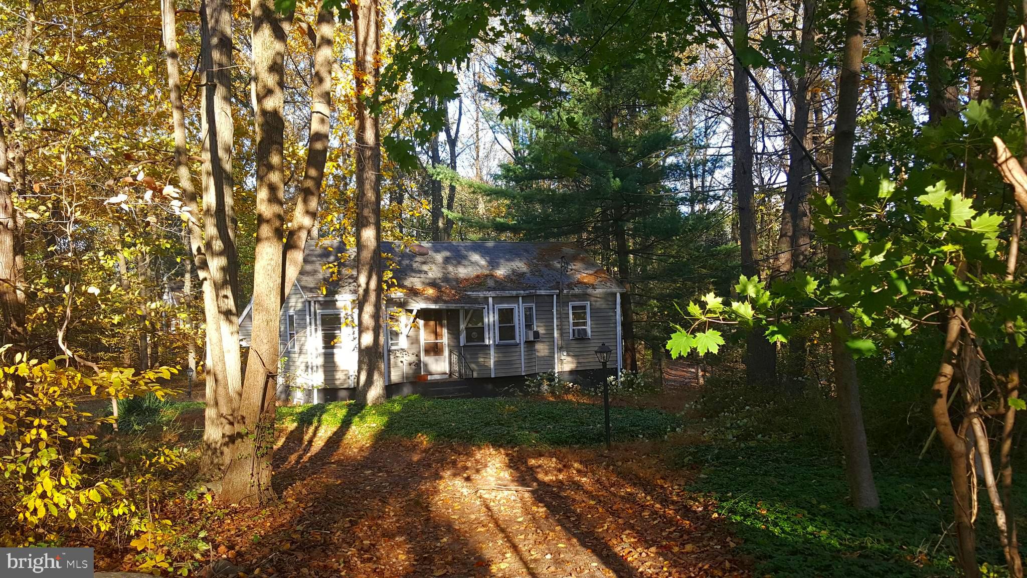 Front view of residence from winding driveway