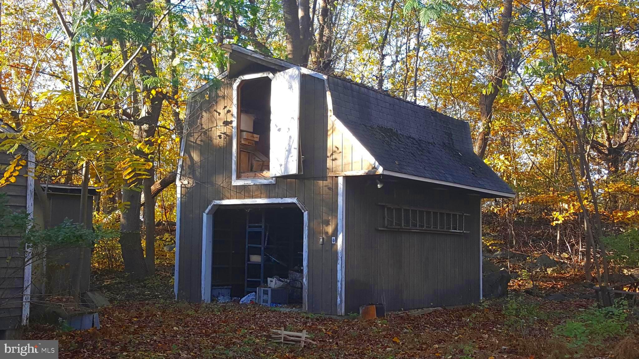 Detached, two-story, one car garage