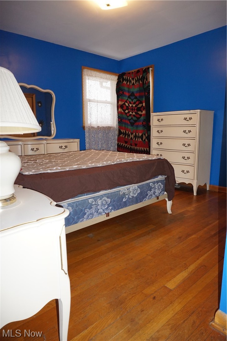 4611 8th Street Northwest Canton, OH 44708 - Photo 18 of 29 Bedroom featuring dark wood-type flooring