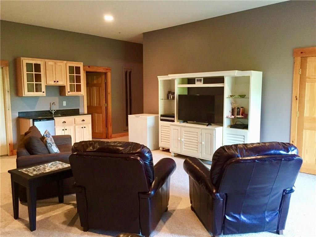 7002 Hardwood Ridge Road, Unit 7002 Kingfield, ME 04947 - Photo 19 of 22 2nd family room downstairs.
