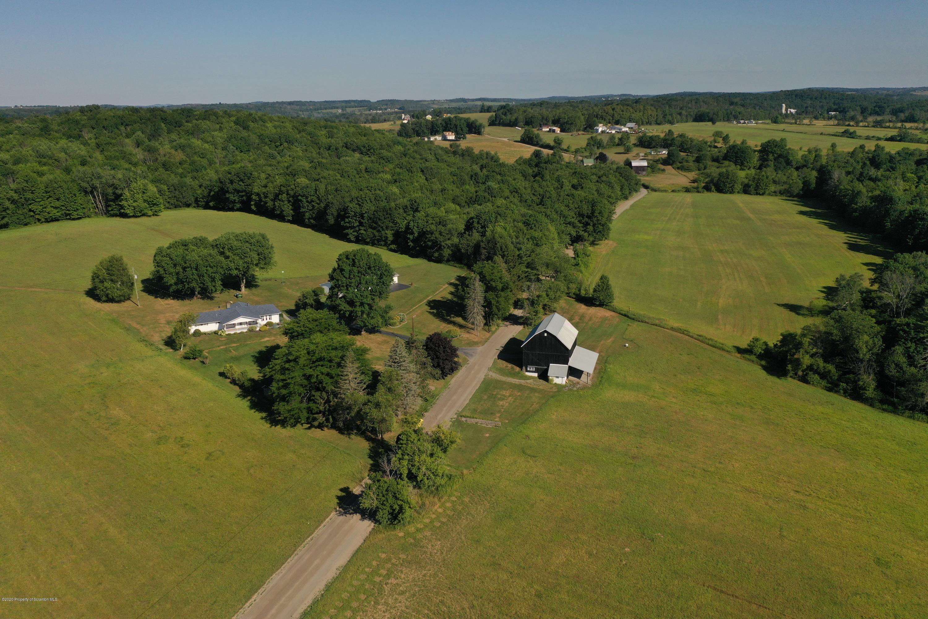 888 Squier Hill Road Nicholson, PA 18446 - Photo 54 of 96 an aerial view of a residential houses with outdoor space and street view