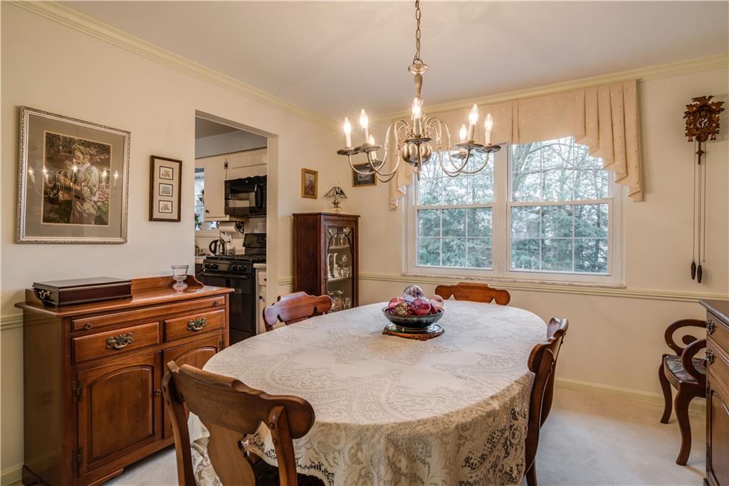 9371 Hilliard Road Pittsburgh, PA 15237 - Photo 5 of 22 DINING ROOM IS 11X11 AND FEATURES CROWN MOLDING AND CHAIR RAIL!