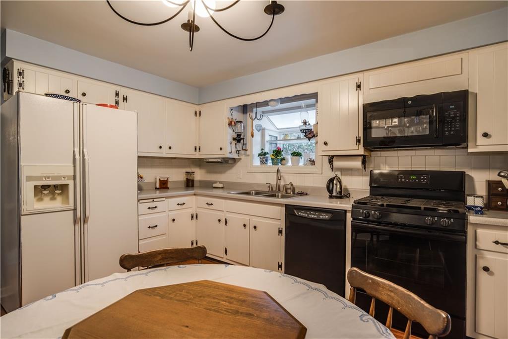 9371 Hilliard Road Pittsburgh, PA 15237 - Photo 7 of 22 THE EAT IN KITCHEN IS 12'x11' AND THE GAS STOVE WAS REPLACED IN 2016!