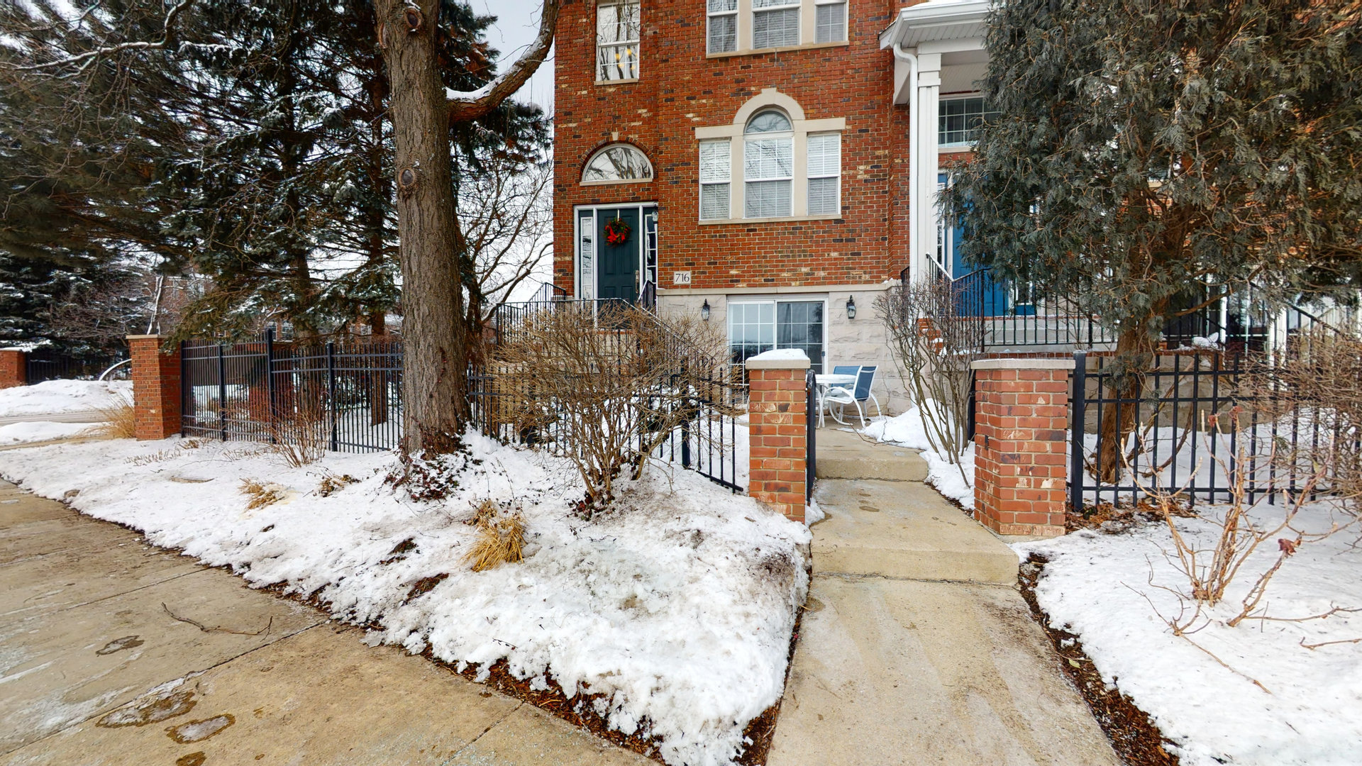 716 Prescott Court Naperville, IL 60563 - Photo 1 of 21 a view of a house with a snow on the road