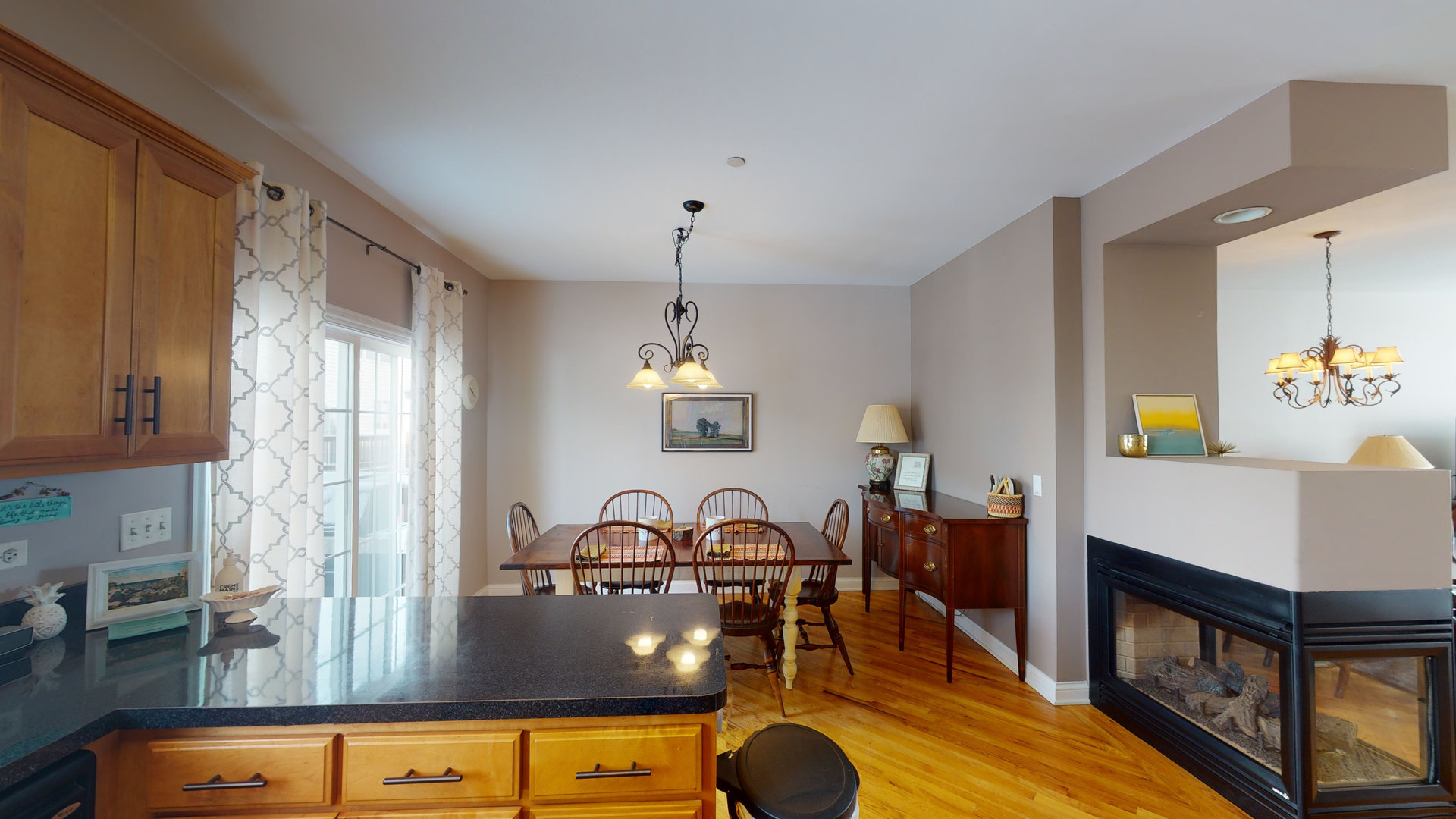 716 Prescott Court Naperville, IL 60563 - Photo 7 of 21 a view of a dining room with furniture window and wooden floor