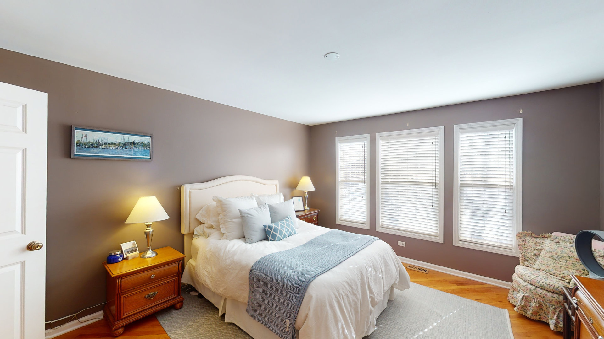 716 Prescott Court Naperville, IL 60563 - Photo 10 of 21 a bedroom with a bed and wooden floor