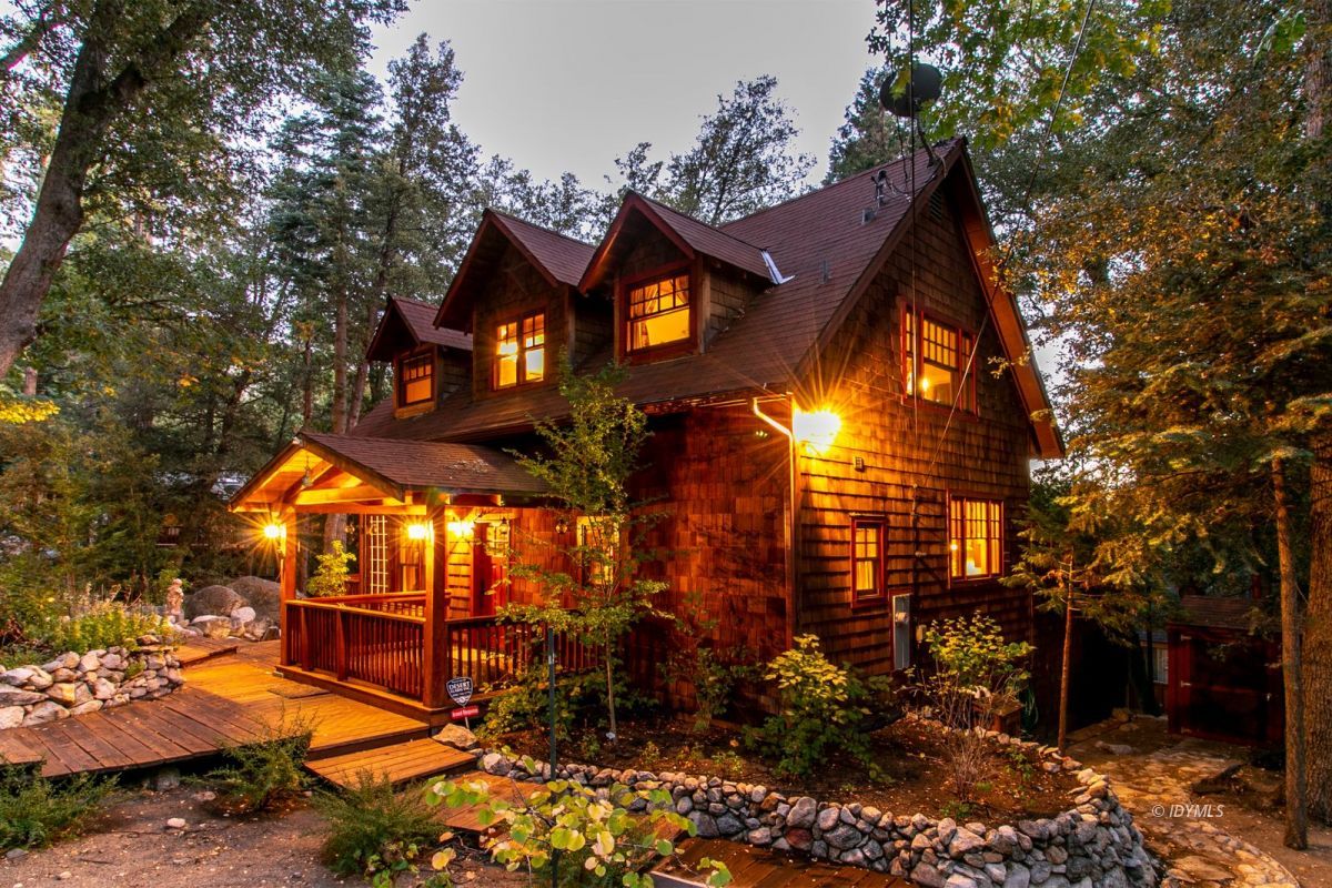 24715 Upper Rim Rock Road Idyllwild, CA 92549 - Photo 2 of 64 a view of a house with a yard