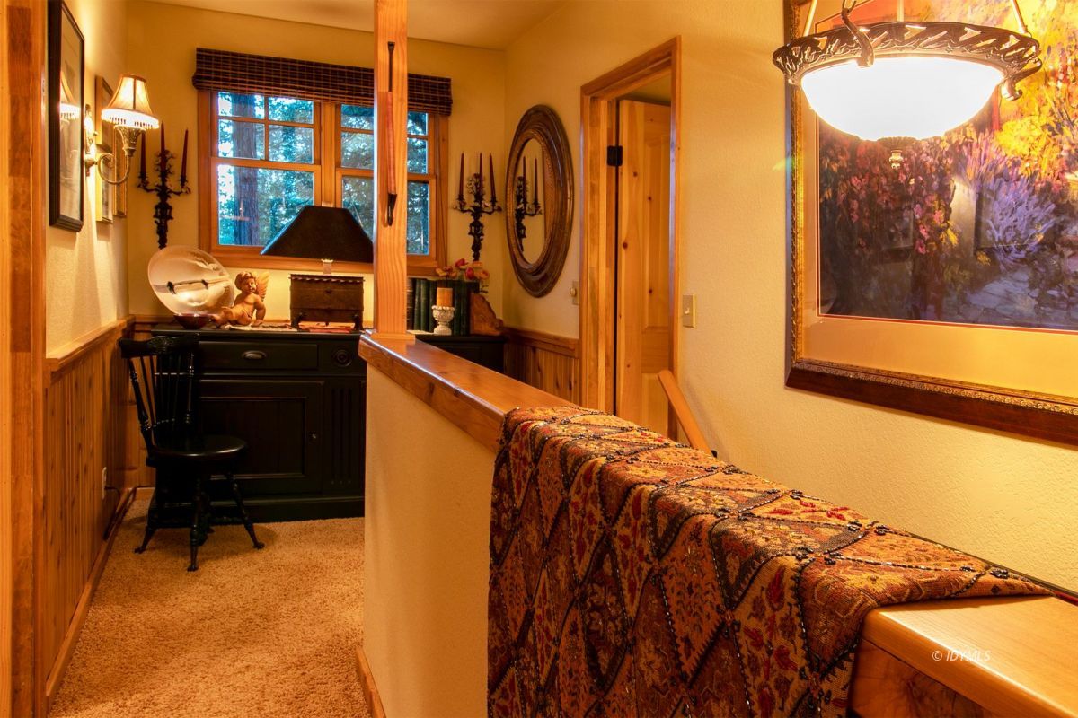 24715 Upper Rim Rock Road Idyllwild, CA 92549 - Photo 50 of 64 a bedroom with a bed and a dresser
