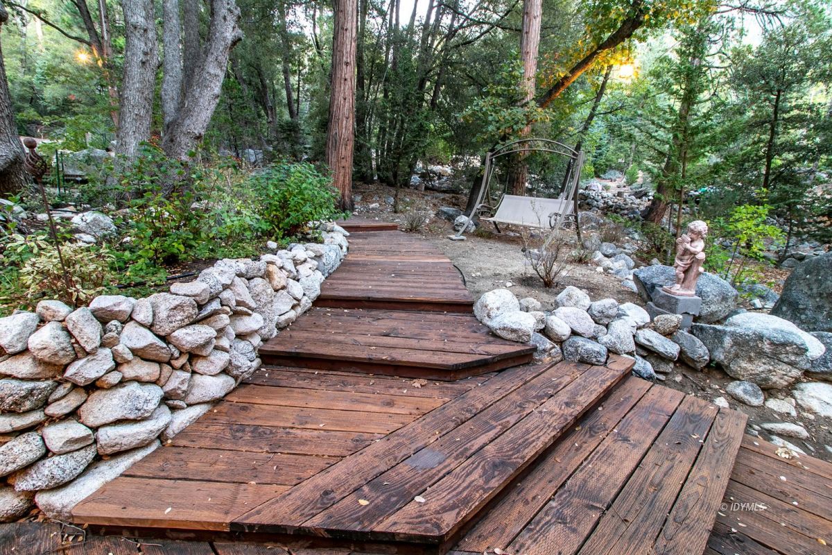 24715 Upper Rim Rock Road Idyllwild, CA 92549 - Photo 61 of 64 a view of a yard with plants