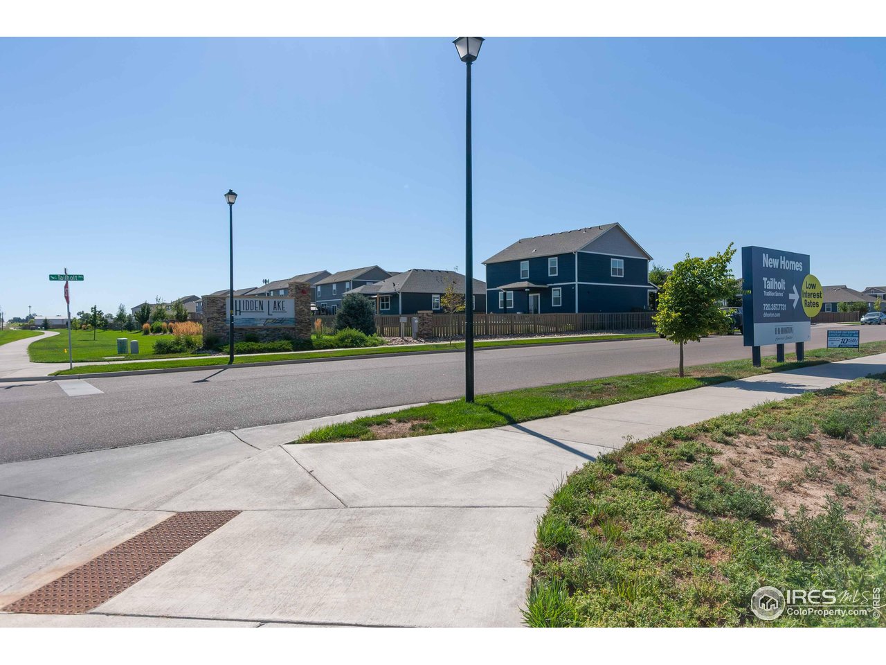 4th Avenue Severance, CO 80550 - Photo 10 of 12 a view of a house with a yard and a street