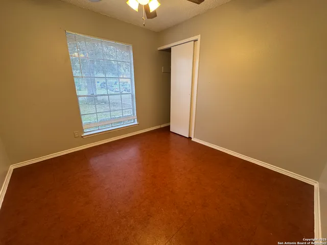 an empty room with windows