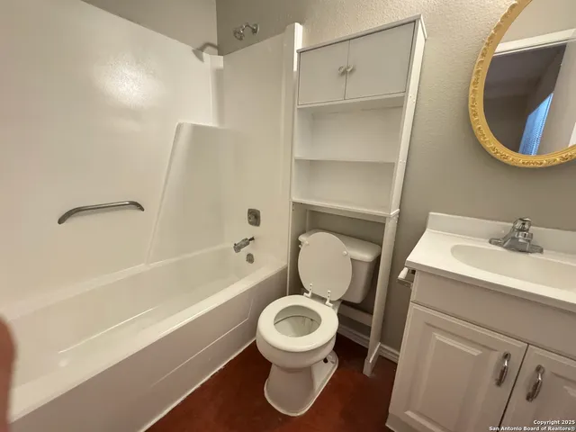 a bathroom with a sink toilet and a bathtub