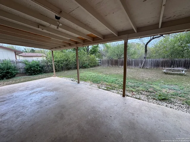 a view of a backyard with green space