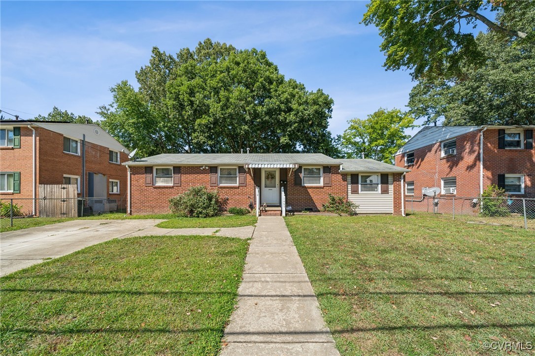 1409 Seward Drive Hampton, VA 23663 - Photo 1 of 35 front view of a house with a yard
