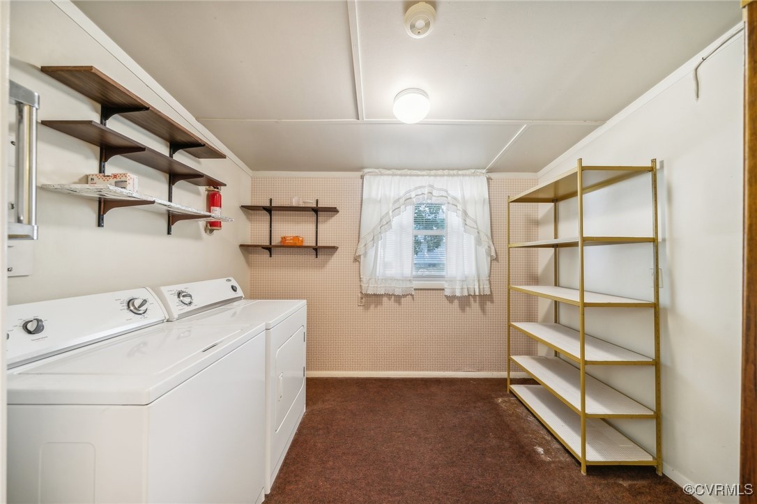 1409 Seward Drive Hampton, VA 23663 - Photo 14 of 35 a view of storage and utility room with washer and dryer
