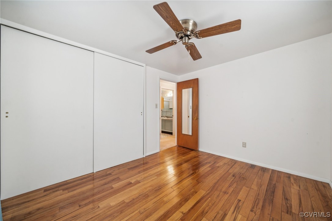 1409 Seward Drive Hampton, VA 23663 - Photo 18 of 35 a view of a big room with wooden floor closet and windows