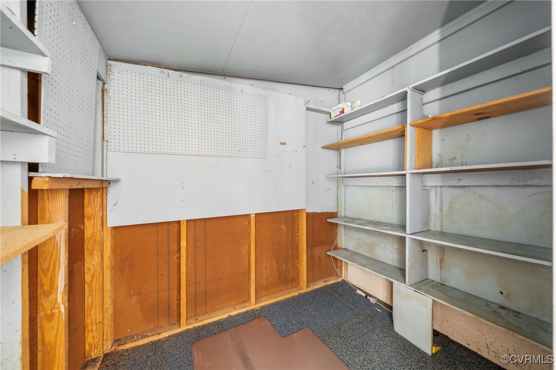 1409 Seward Drive Hampton, VA 23663 - Photo 27 of 35 a view of a room with rack on the wall and a window