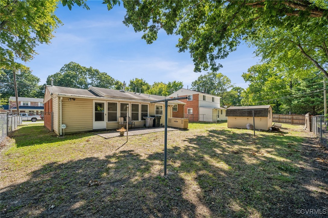 1409 Seward Drive Hampton, VA 23663 - Photo 29 of 35 a house that has a tree in front of it