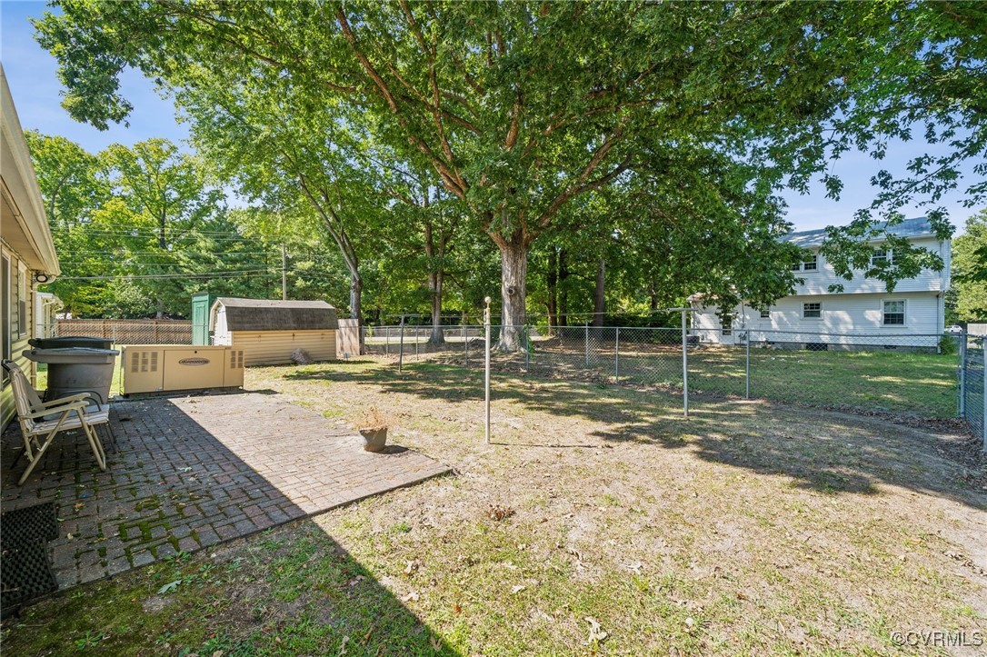 1409 Seward Drive Hampton, VA 23663 - Photo 32 of 35 a backyard of a house with table and chairs