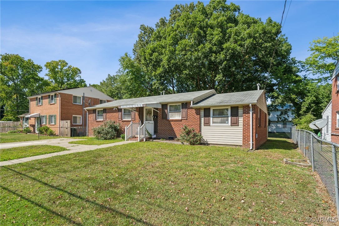 1409 Seward Drive Hampton, VA 23663 - Photo 35 of 35 a view of a house with a yard