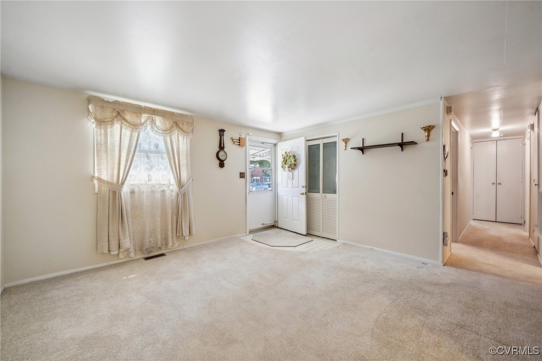 1409 Seward Drive Hampton, VA 23663 - Photo 5 of 35 a view of an empty room with a window