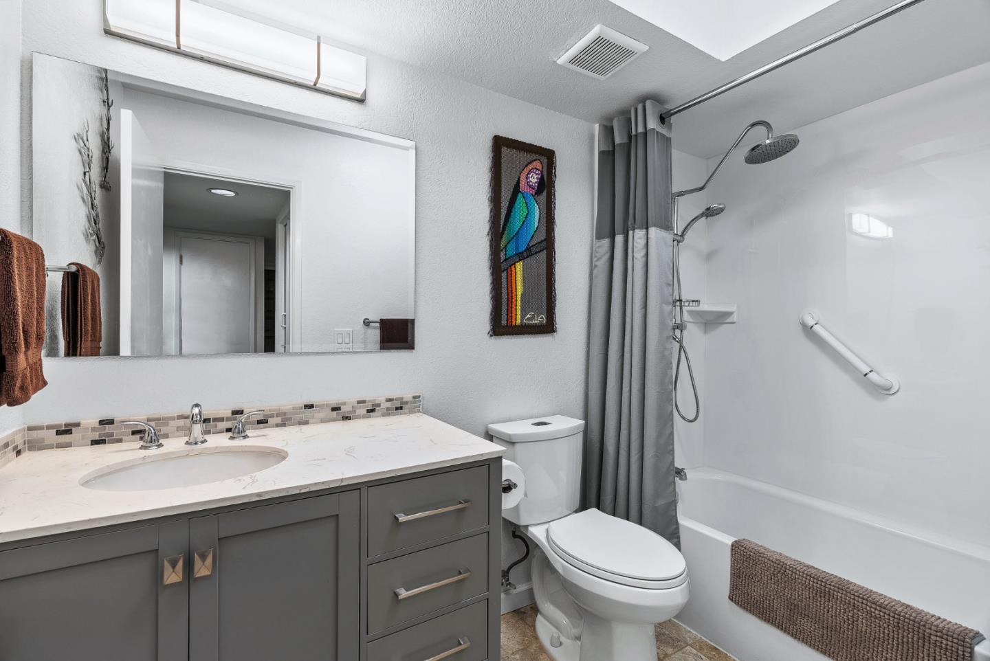 111 Bean Creek Road, Unit 115 Scotts Valley, CA 95066 - Photo 13 of 24 a bathroom with a sink toilet and shower