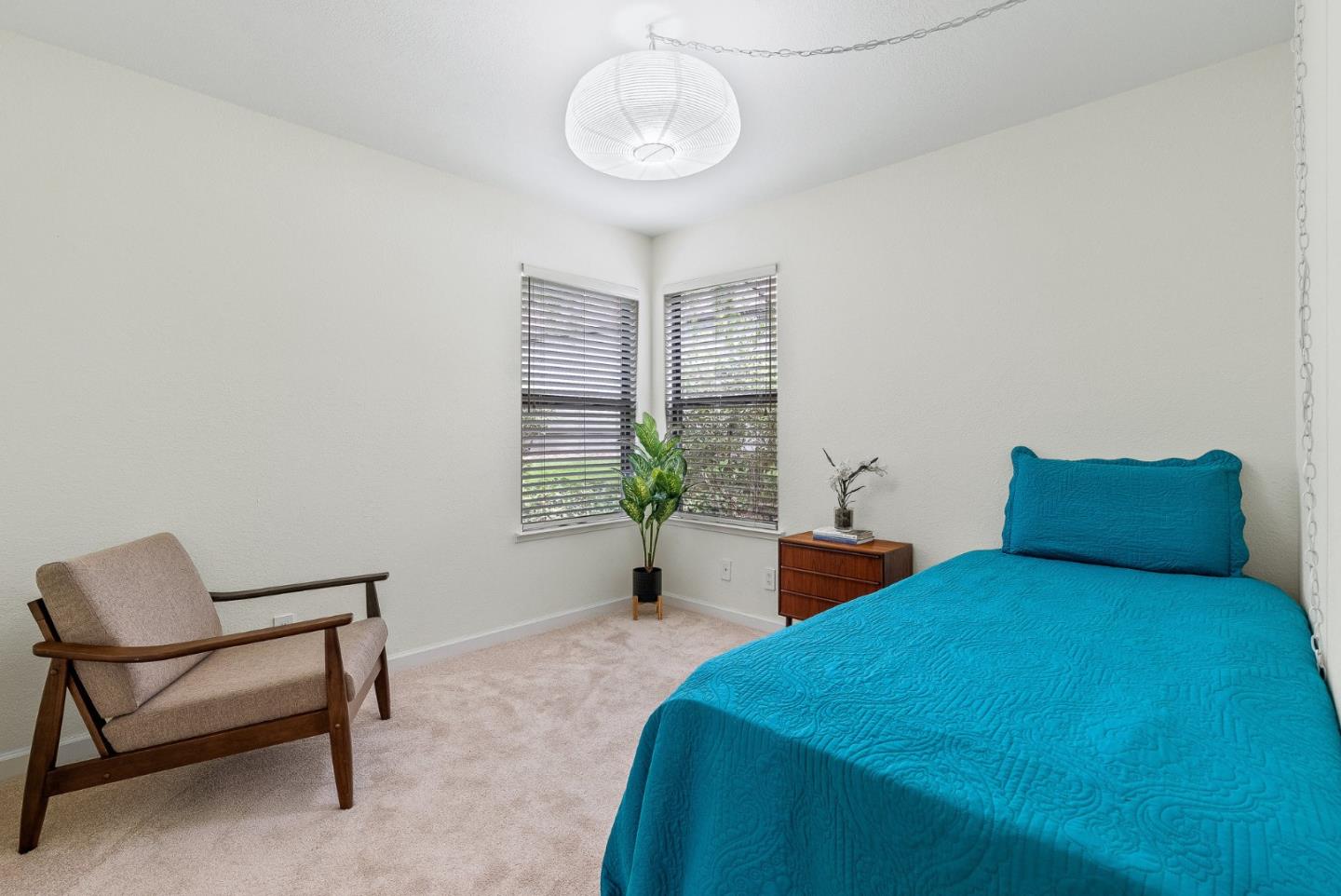 111 Bean Creek Road, Unit 115 Scotts Valley, CA 95066 - Photo 16 of 24 a bedroom with bed and a window