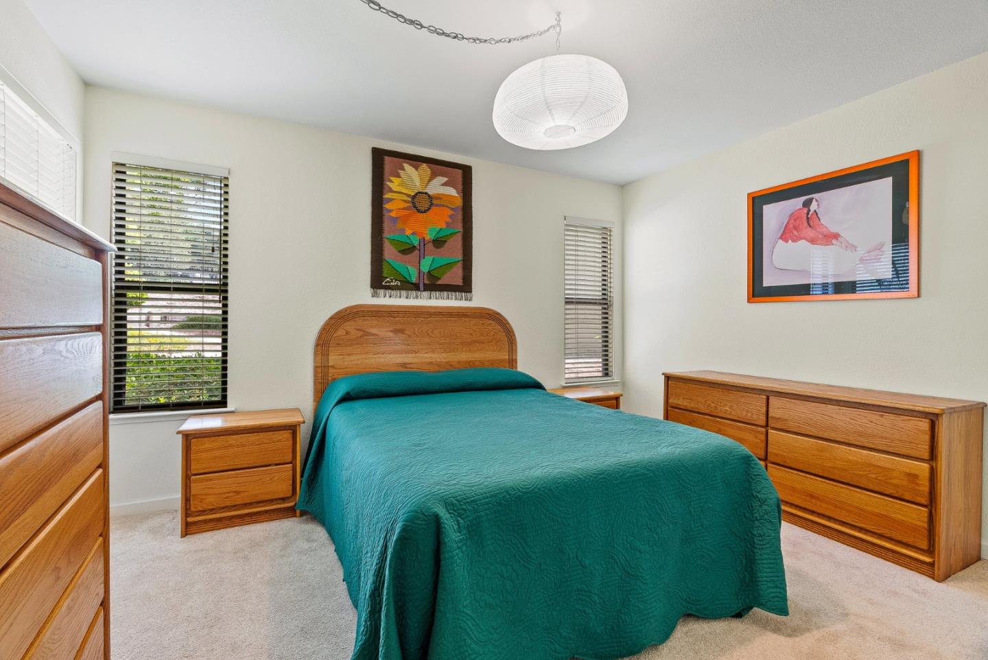 111 Bean Creek Road, Unit 115 Scotts Valley, CA 95066 - Photo 17 of 24 a bedroom with a bed and a painting on the wall