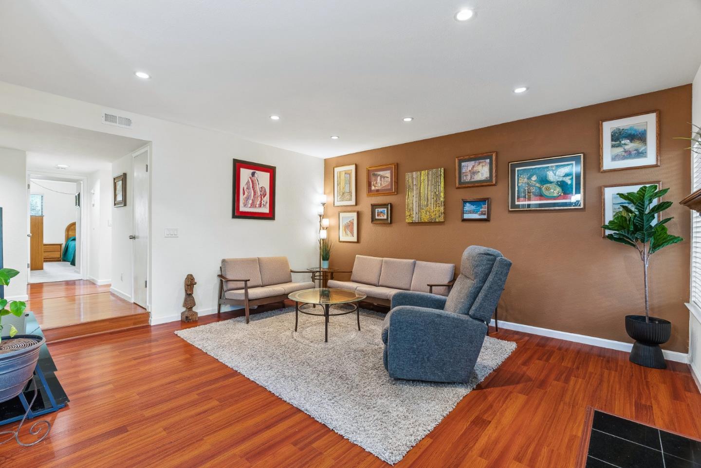 111 Bean Creek Road, Unit 115 Scotts Valley, CA 95066 - Photo 5 of 24 a living room with furniture and a wooden floor