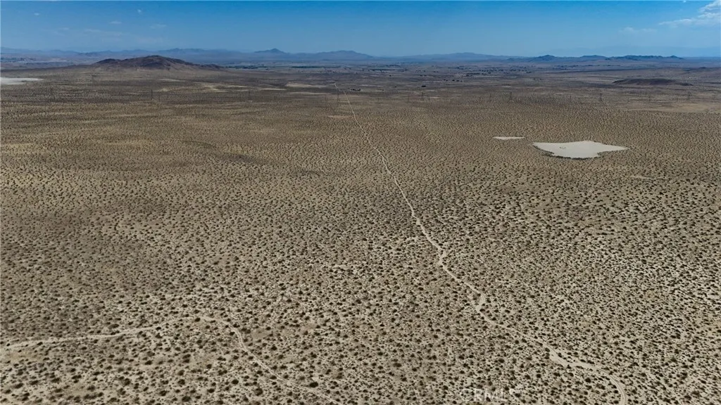 736 Fossil Bed Road Hinkley, CA 92347 - Photo 6 of 11 Red boundary lines on pictures are an estimate and for marketing purposes only. Buyer to verify all aspects of this property including, but not limited to utilities, assessments, boundaries, usage, access, and zoning to satisfy themselves.