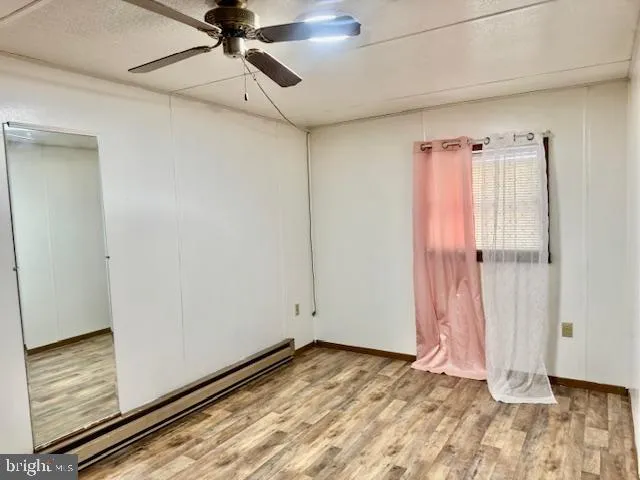 a view of a room with rack on the wall